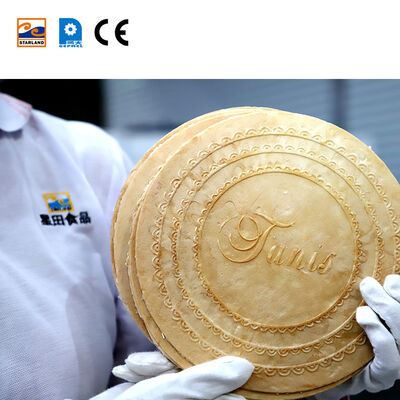 Linha de produção de wafer de óleos de aço inoxidável com sistema de controlo PLC e suporte técnico de vídeo após serviço para operação